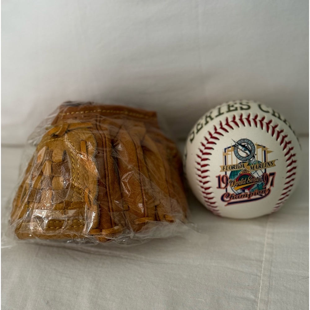 World series 1997 marlins ball and mini glove. Never opened
